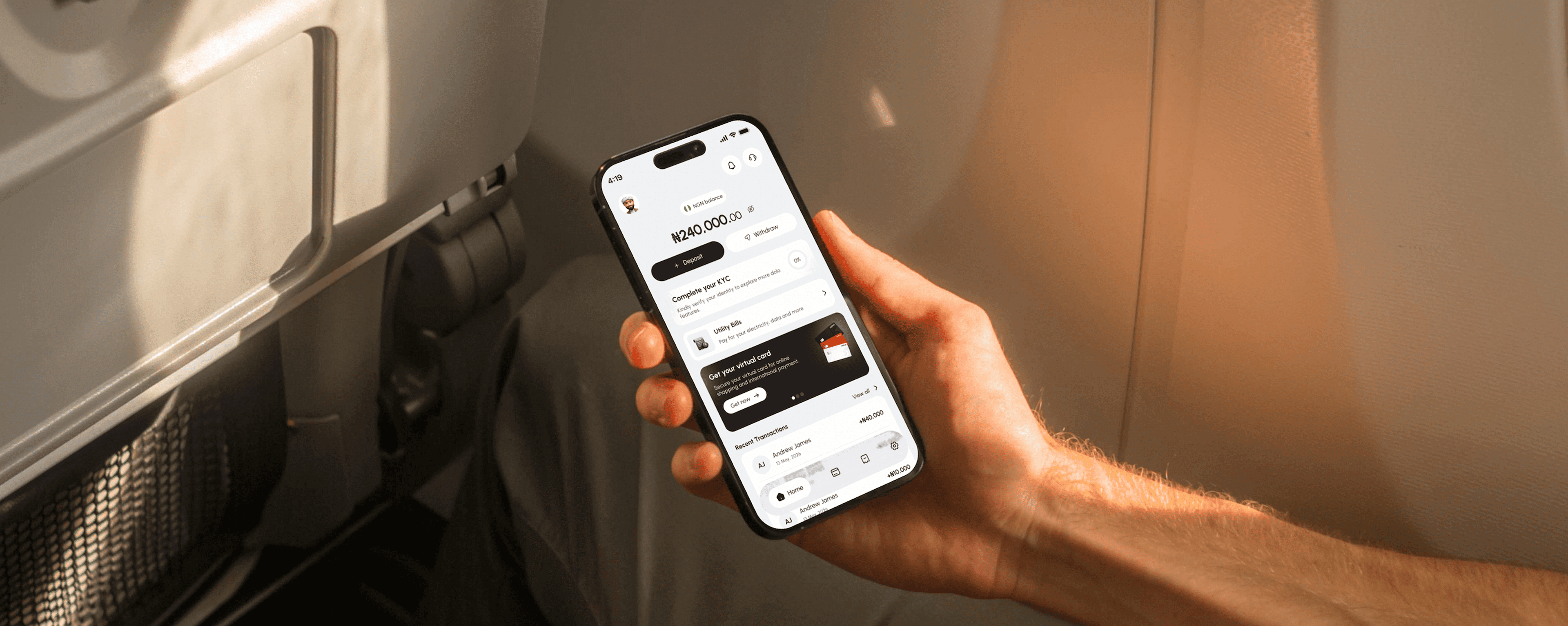 Man holding a phone showing the Dolo app wallet balance and recent transactions